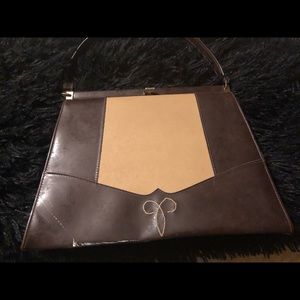 Vintage handbag from the 50s, I think.  Amazing shape for the age.
